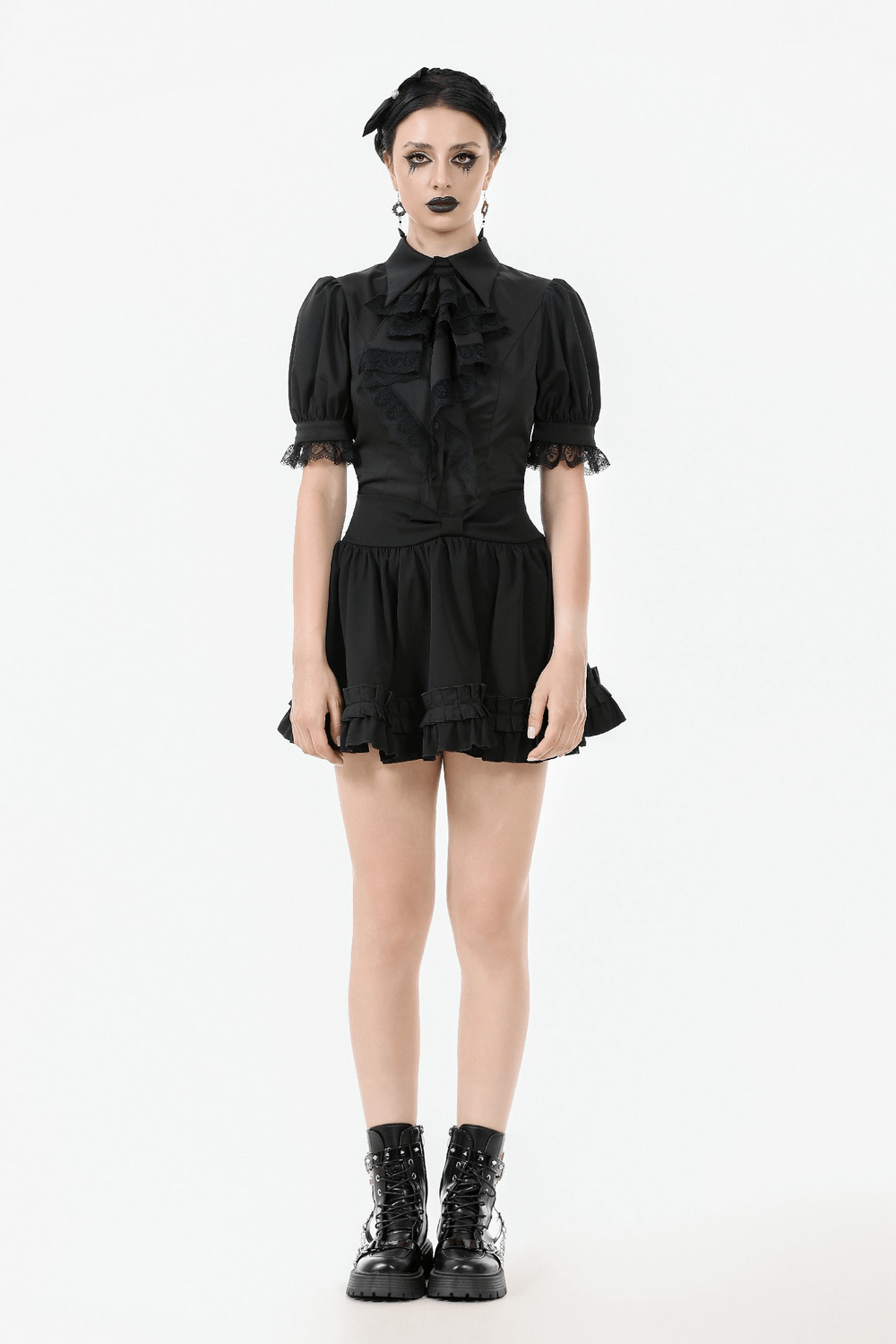 Gothic fashion model in a black satin blouse with lace ruffles and puff sleeves, styled with edgy accessories.