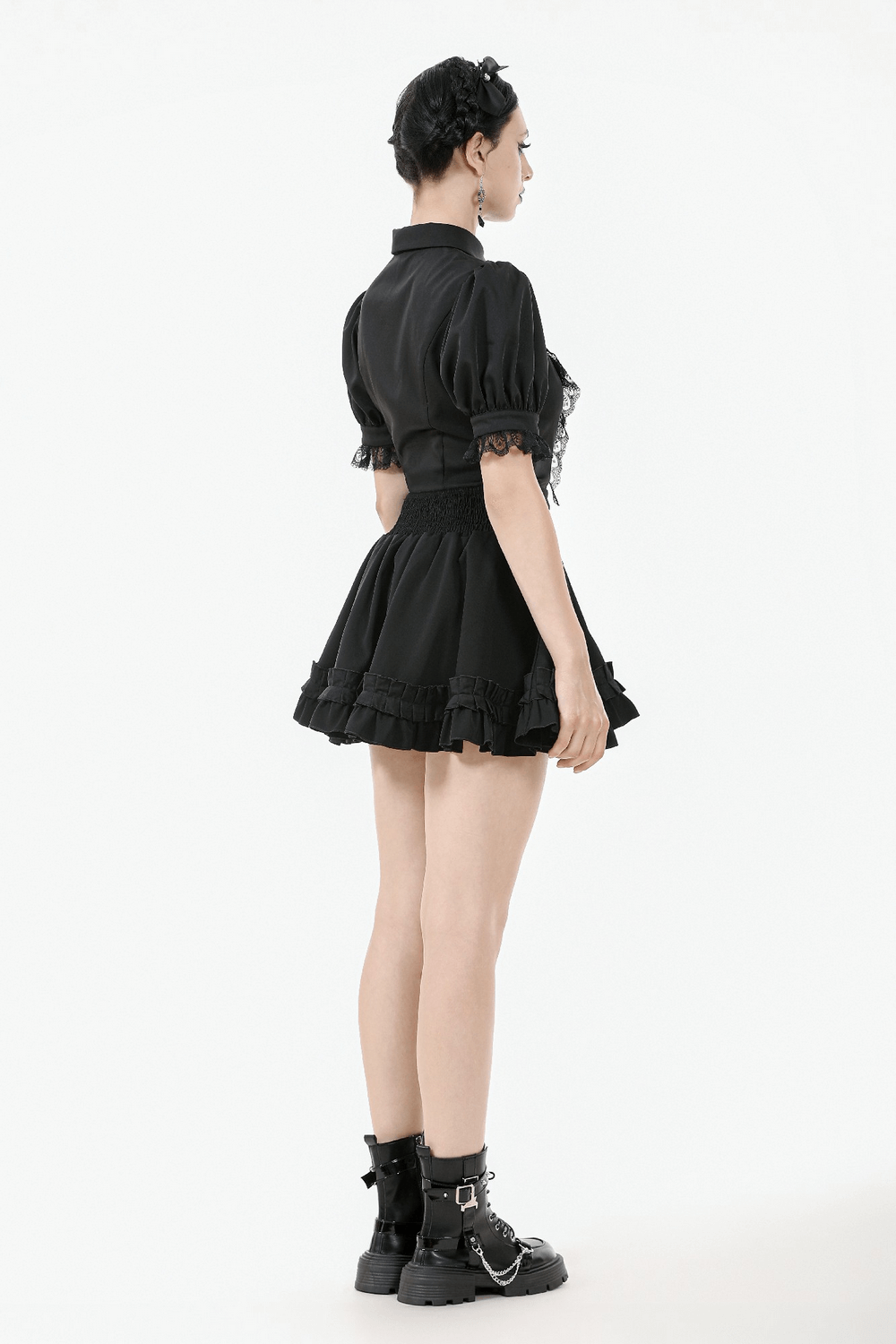 Back view of a gothic black ruffle lace blouse with puff sleeves and layered skirt, showcasing elegant Victorian style.