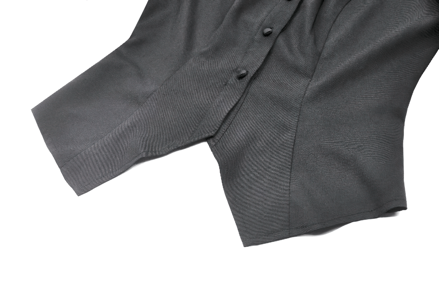 Elegant black satin blouse showcasing a ruffled hem and buttons, perfect for goth fashion enthusiasts.