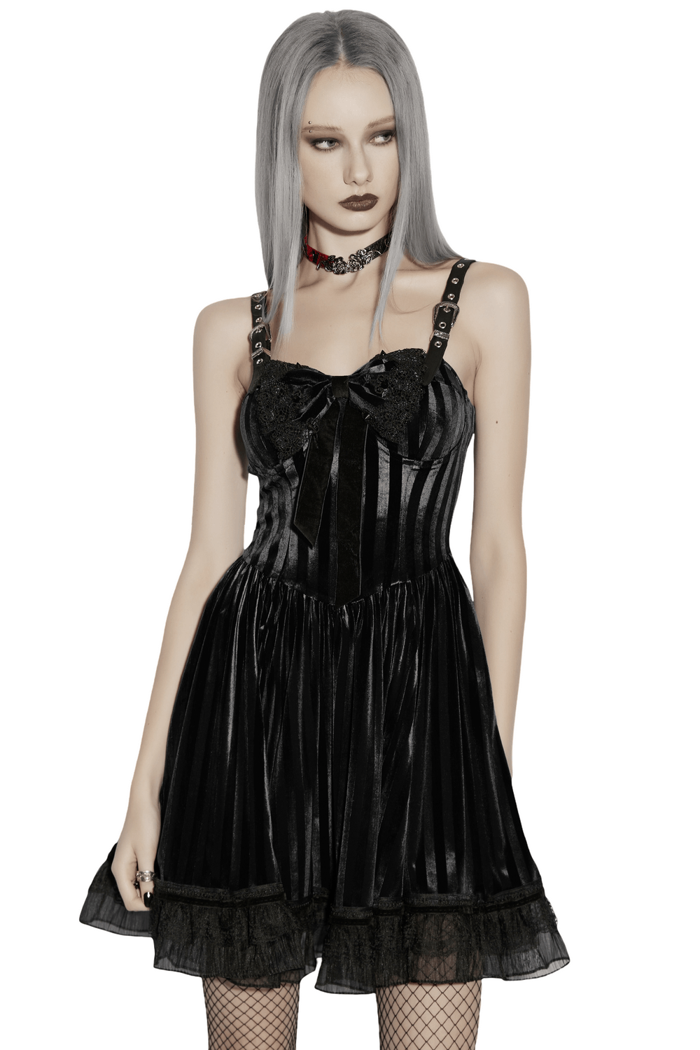 Goth Striped Dress with Lace Up Back and Bow Detail on model, showcasing gothic velvet fabric and lace hem.