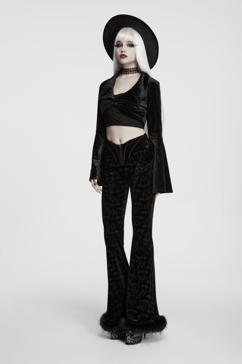 Goth Velvet Bolero with Bat Collar and Bell Sleeves displayed on a model wearing stylish gothic attire.
