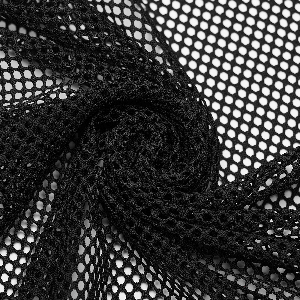 Close-up of black mesh fabric with netted pattern, perfect for goth style garments and layering.