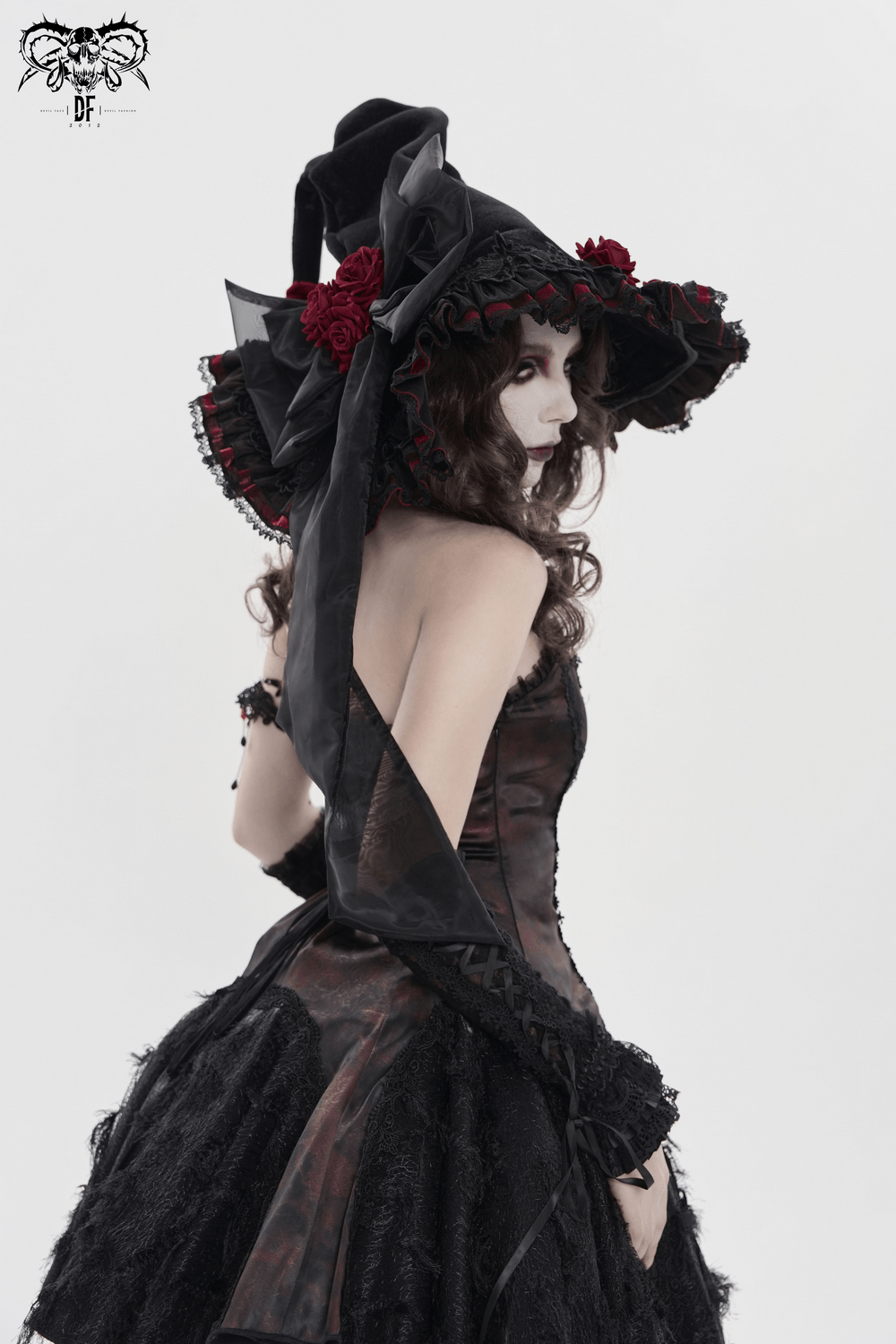 Goth Witch Hat with Roses and Sheer Ribbon Trim for Women worn by a model in a black dress.