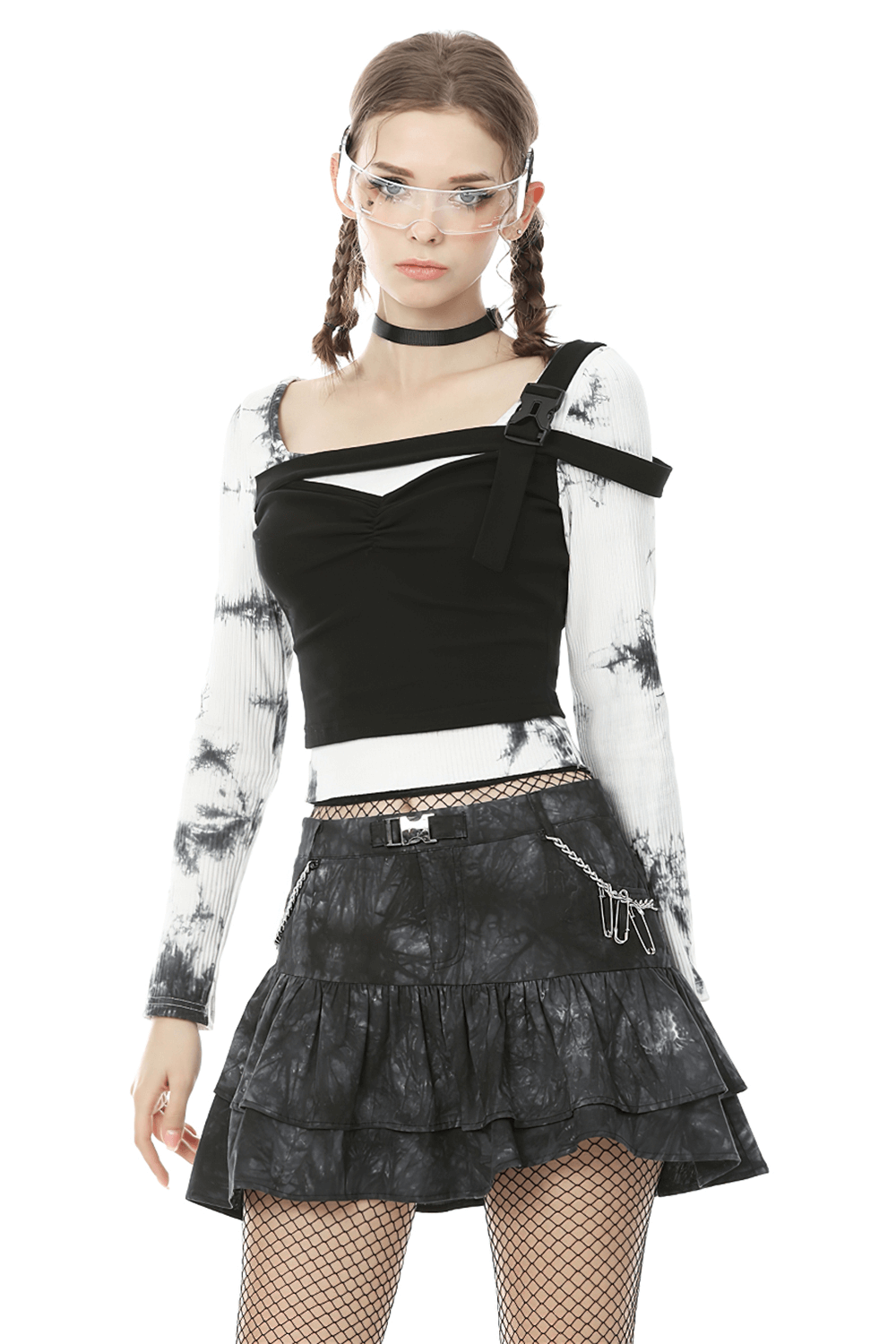 Goth women's mini skirt with ruffles and chains, paired with a black top, perfect for a rock-inspired outfit.