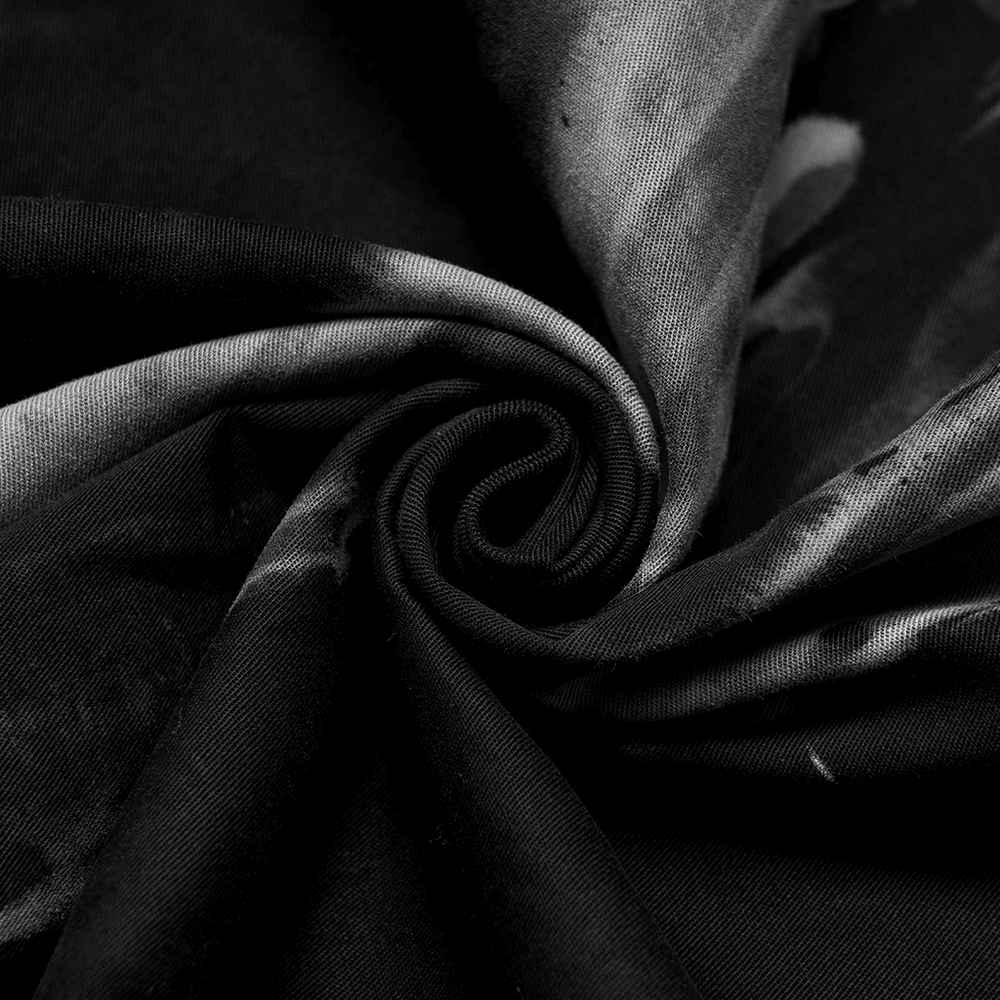 Close-up of luxurious black fabric showcasing its smooth texture, perfect for fashion-forward designs like Gothic skirts.