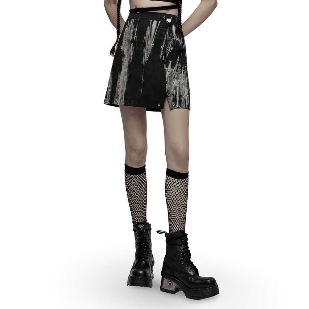 Gothic A-Line skirt with heart buckle, side slit, and tie-dye pattern, styled with fishnet socks and combat boots.