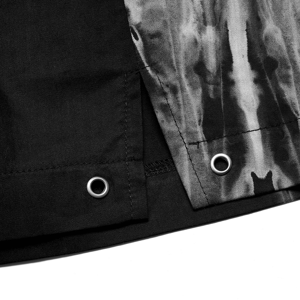 Close-up of Gothic A-Line Skirt showing tie-dye pattern and side slit detailing with grommet accents.