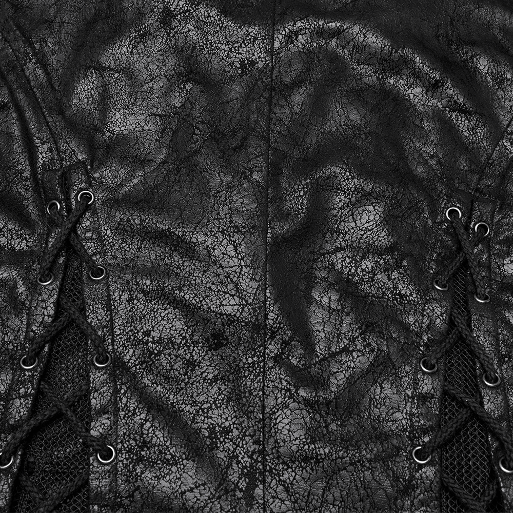 Close-up of gothic alien cape featuring cracked leather and lace-up design with eyelets.