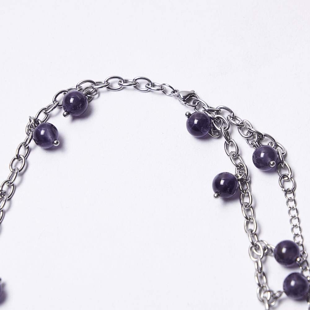 Gothic Amethyst Crystal Necklace with Cross Pendant featuring natural amethyst beads and silver chain.