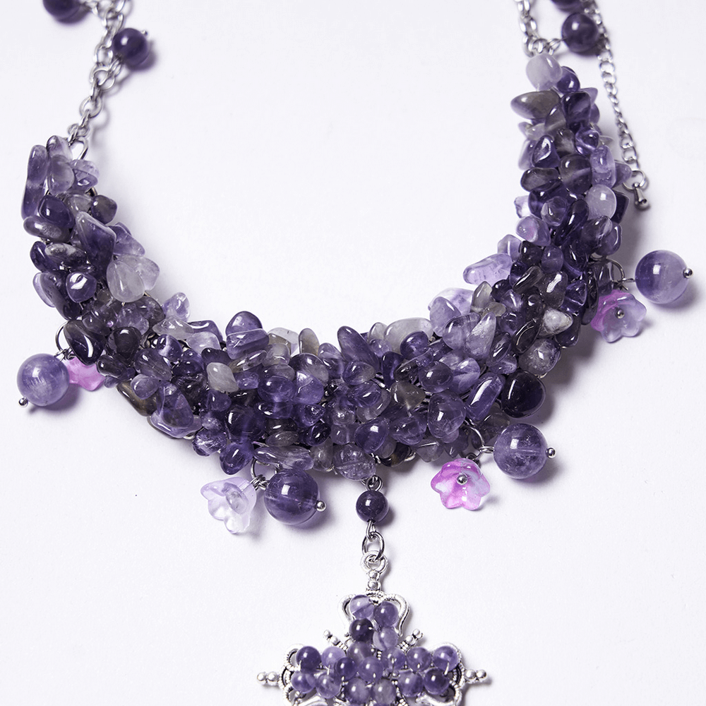 Gothic Amethyst Crystal Necklace with Cross Pendant featuring natural amethyst stones and ornate cross charm.