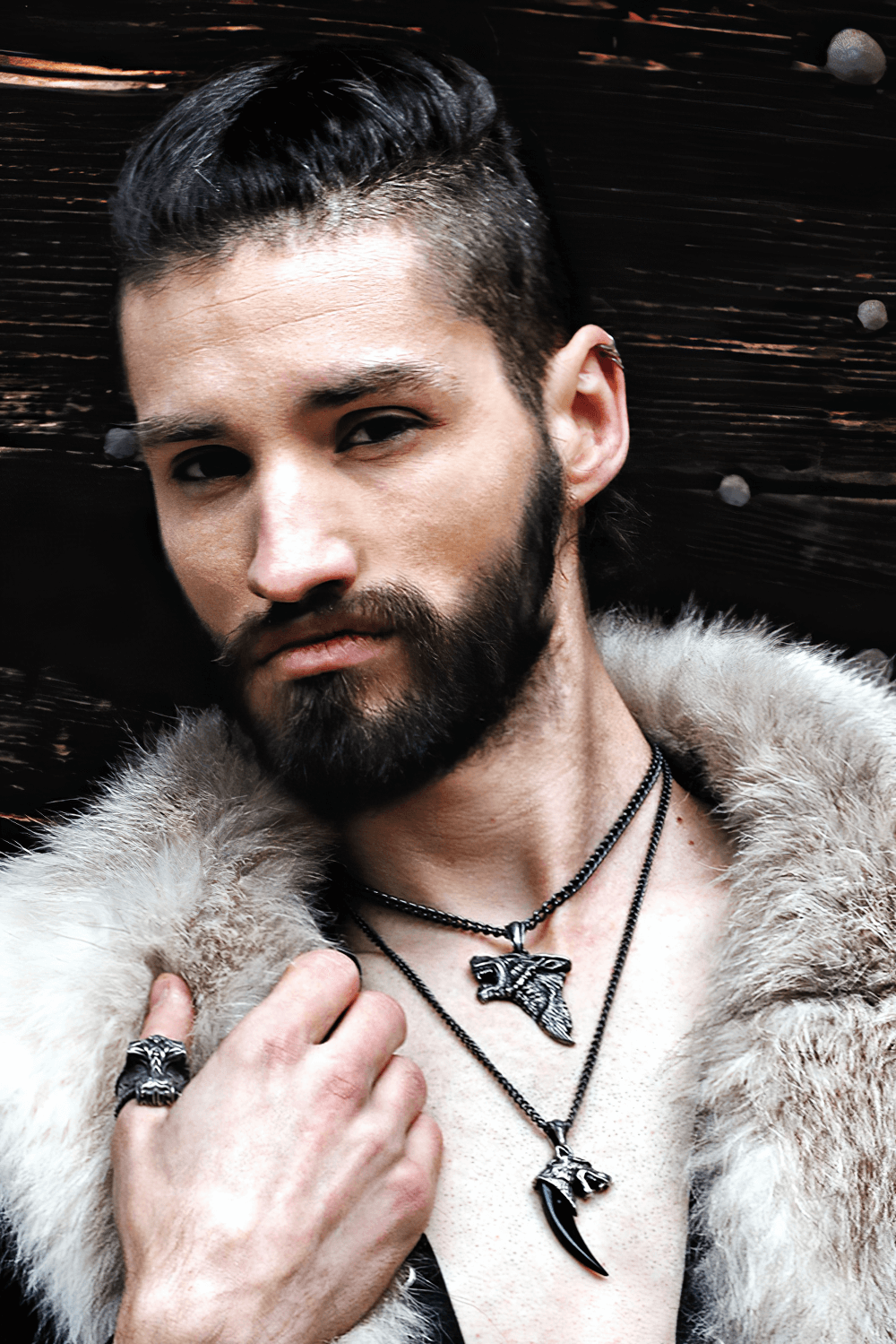Model showcasing Gothic Dark Wolf Head Pendant necklace with fierce Viking style, exuding strength and mystery.