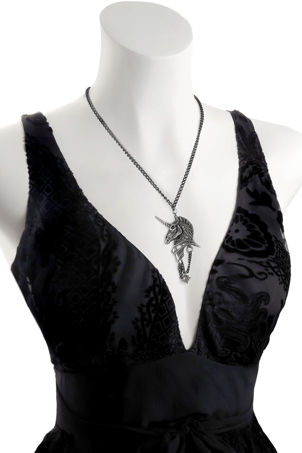 Gothic antiqued pewter unicorn head pendant on a black chain, showcased on a stylish dress.