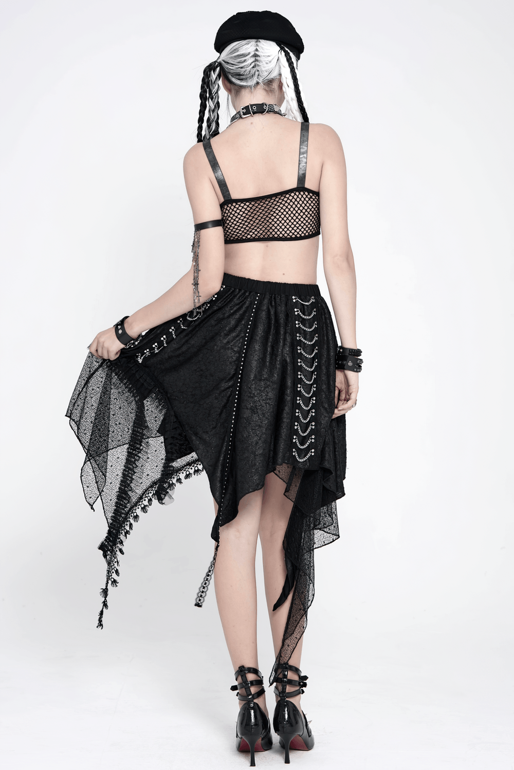 Gothic Asymmetric Lace Midi Skirt with Chain Trim showcased on a model, featuring handkerchief hem and sheer lace details.
