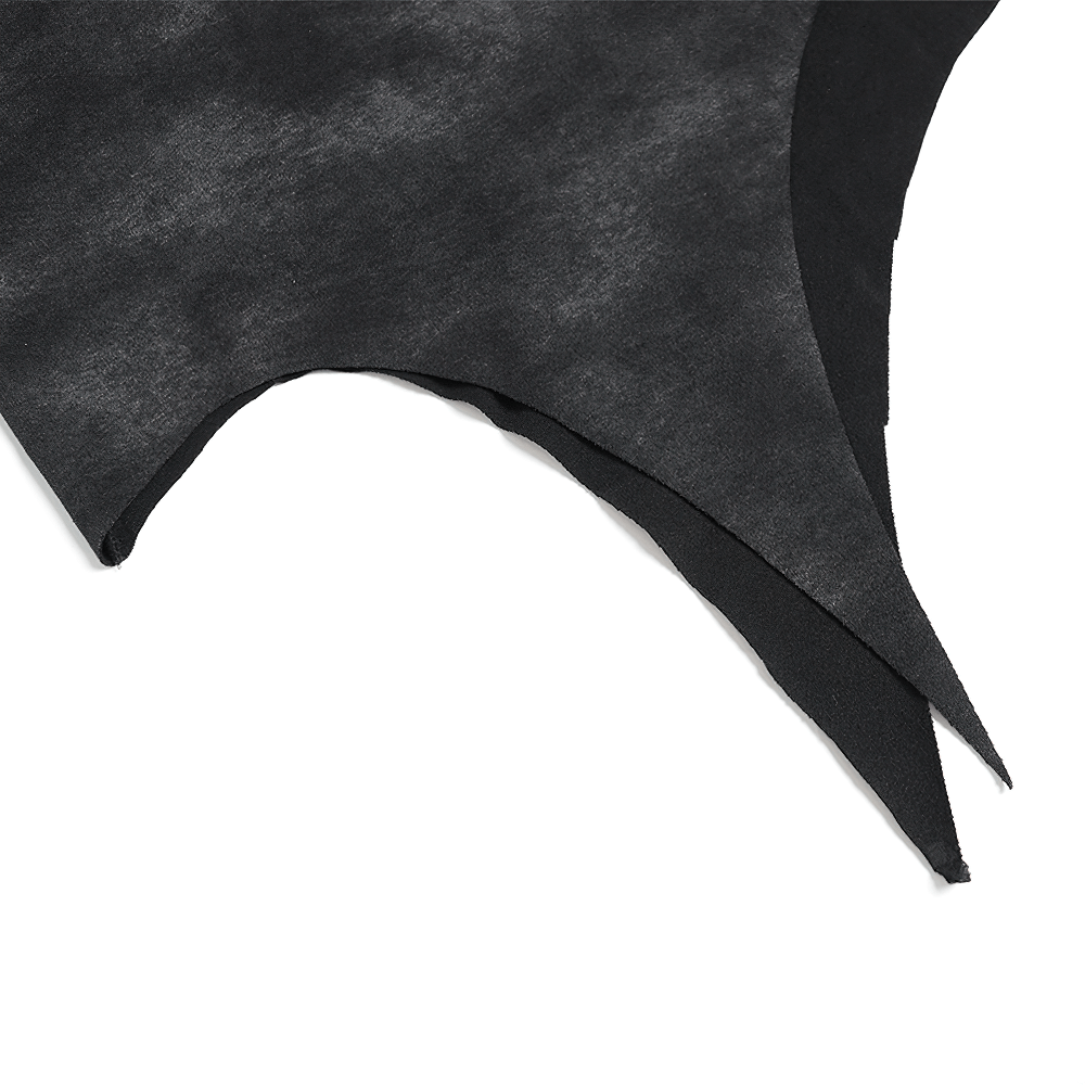 Close-up of gothic asymmetric hem fabric in dark washed material for punk skull t-shirt.