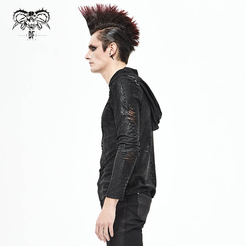 Side view of a man wearing a gothic asymmetrical black hoodie with oversized hood in punk style.