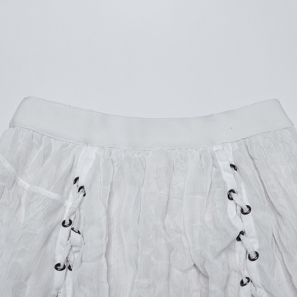 Close-up of the waistband of a Gothic asymmetric white chiffon skirt with lace and drawstrings.