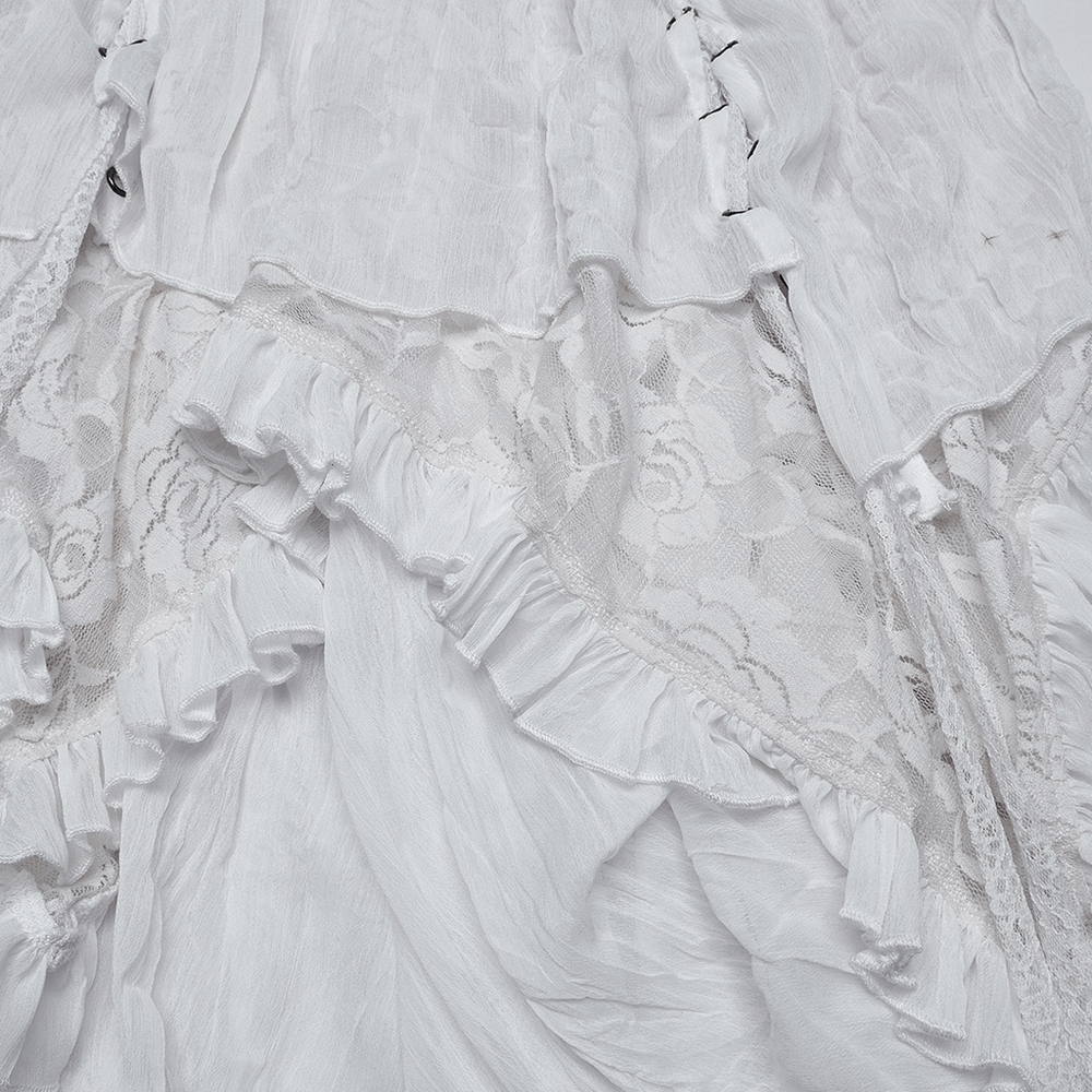 Close-up of gothic asymmetric white chiffon skirt featuring delicate lace and ruffled accents, showcasing unique texture.