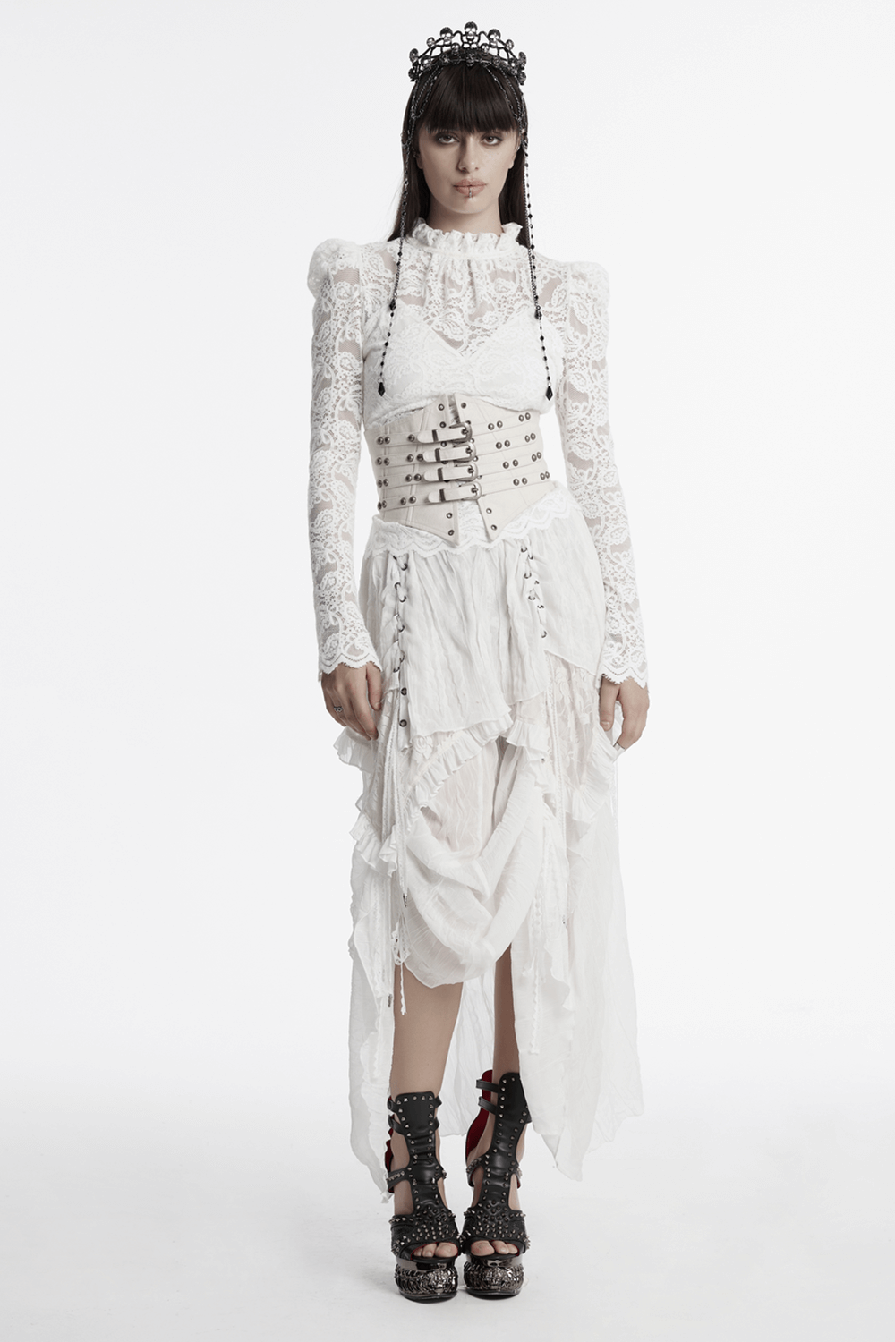 Model in Gothic asymmetric white chiffon skirt with lace and drawstrings, showcasing elegant and edgy fashion style.