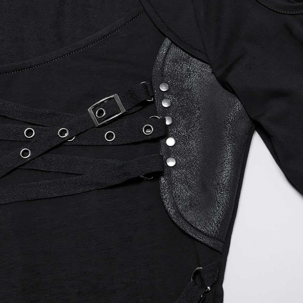 Close-up of gothic asymmetrical long sleeve top showing edgy straps and textured cutout details.