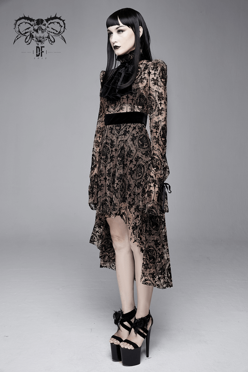Gothic asymmetrical long dress with lace detail on model, showcasing elegant black fashion and stylish long sleeves.