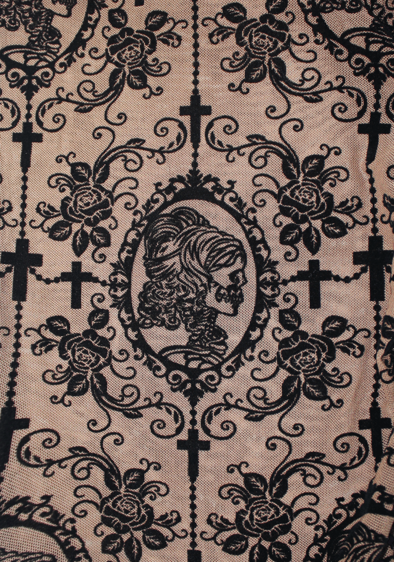 Intricate gothic lace fabric featuring roses, skulls, and crosses in a captivating design.