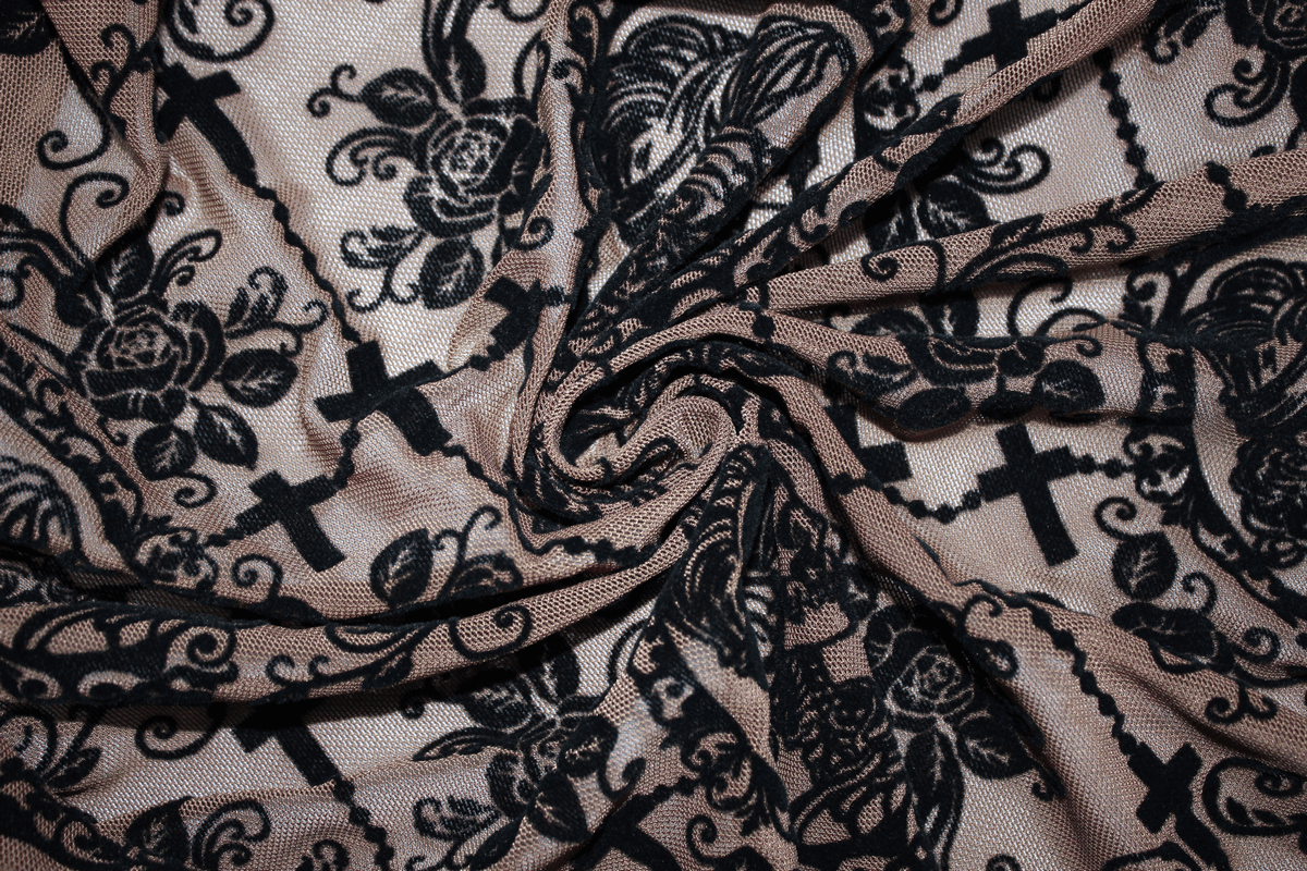 Lace fabric featuring intricate black floral and cross patterns, ideal for gothic fashion.