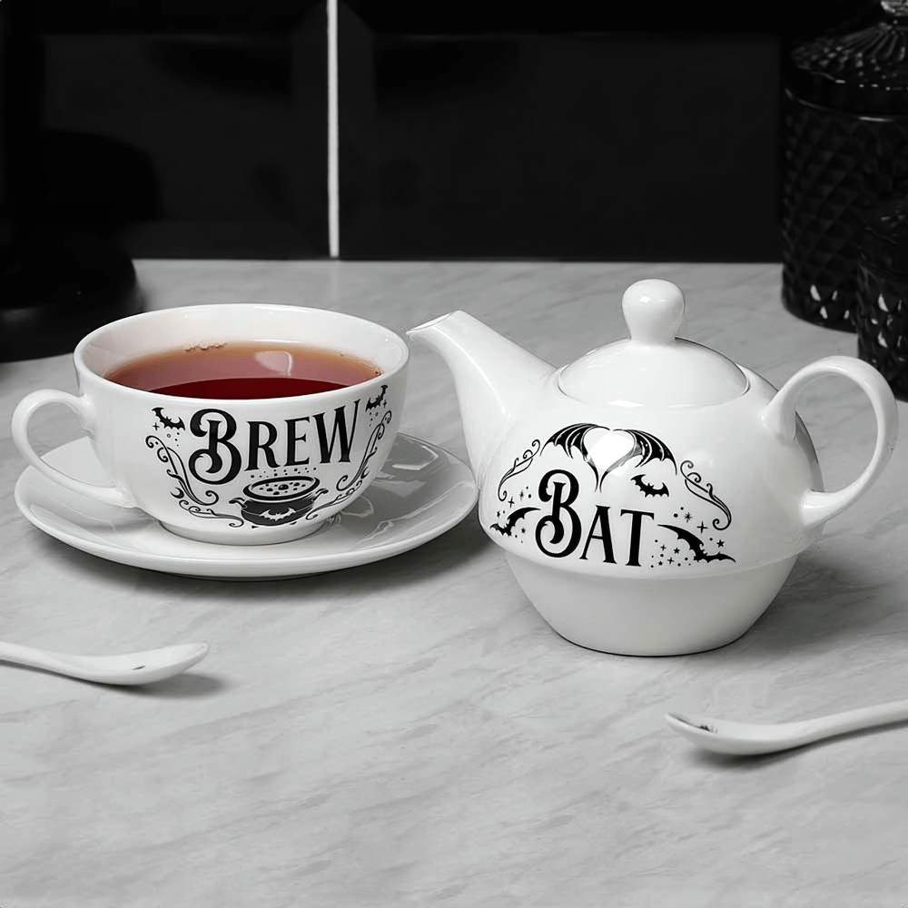Gothic Bat Brew tea set featuring a teapot and cup designed for tea lovers, perfect for a spooky tea time.