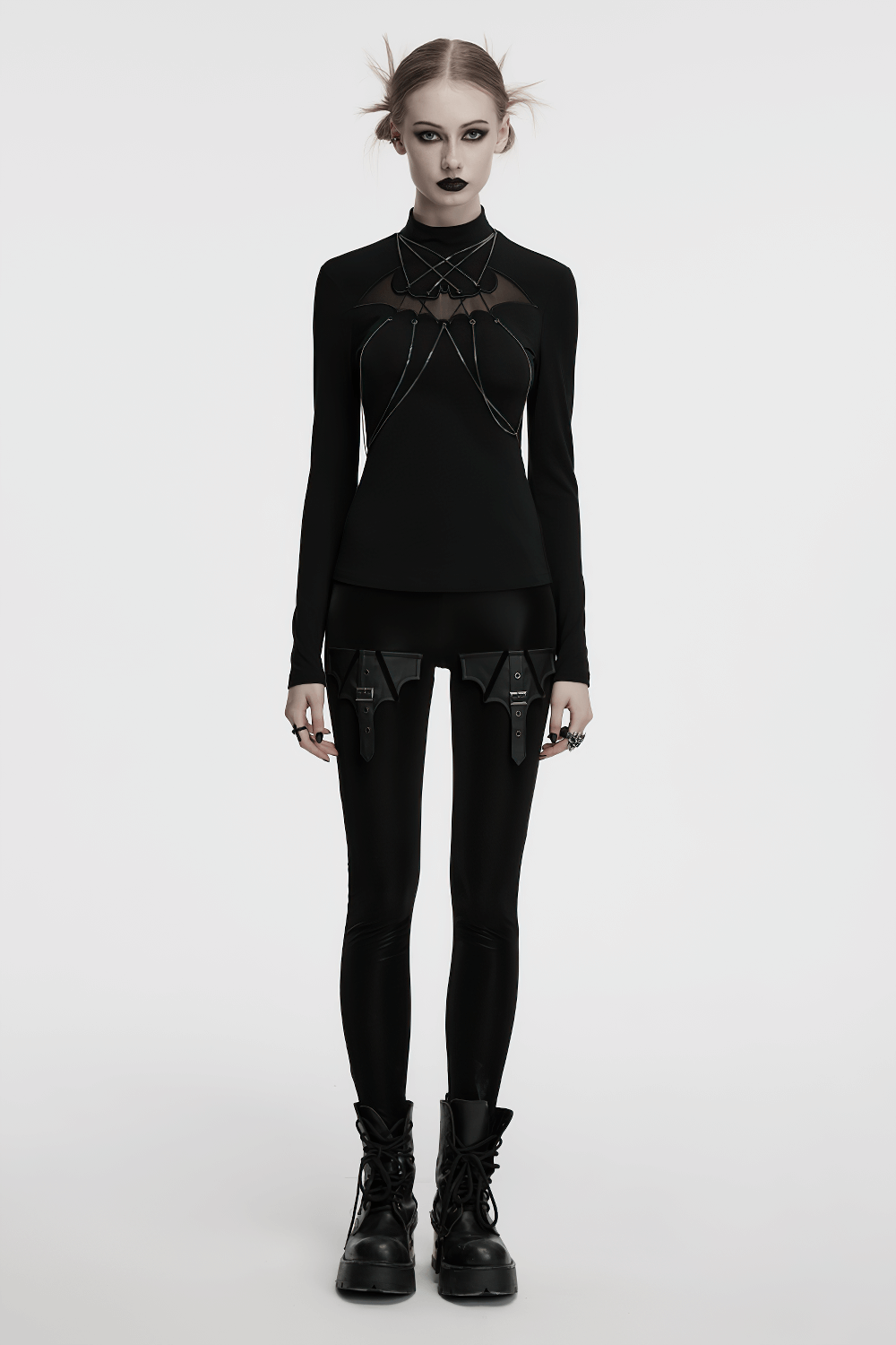 Gothic bat chain long sleeve top with mesh detail, paired with edgy leggings and boots, perfect for punk style enthusiasts.