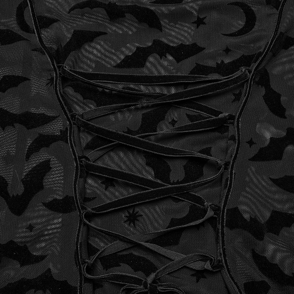 Close-up of gothic bat mesh fabric with lacing details in black, showcasing a spooky design.