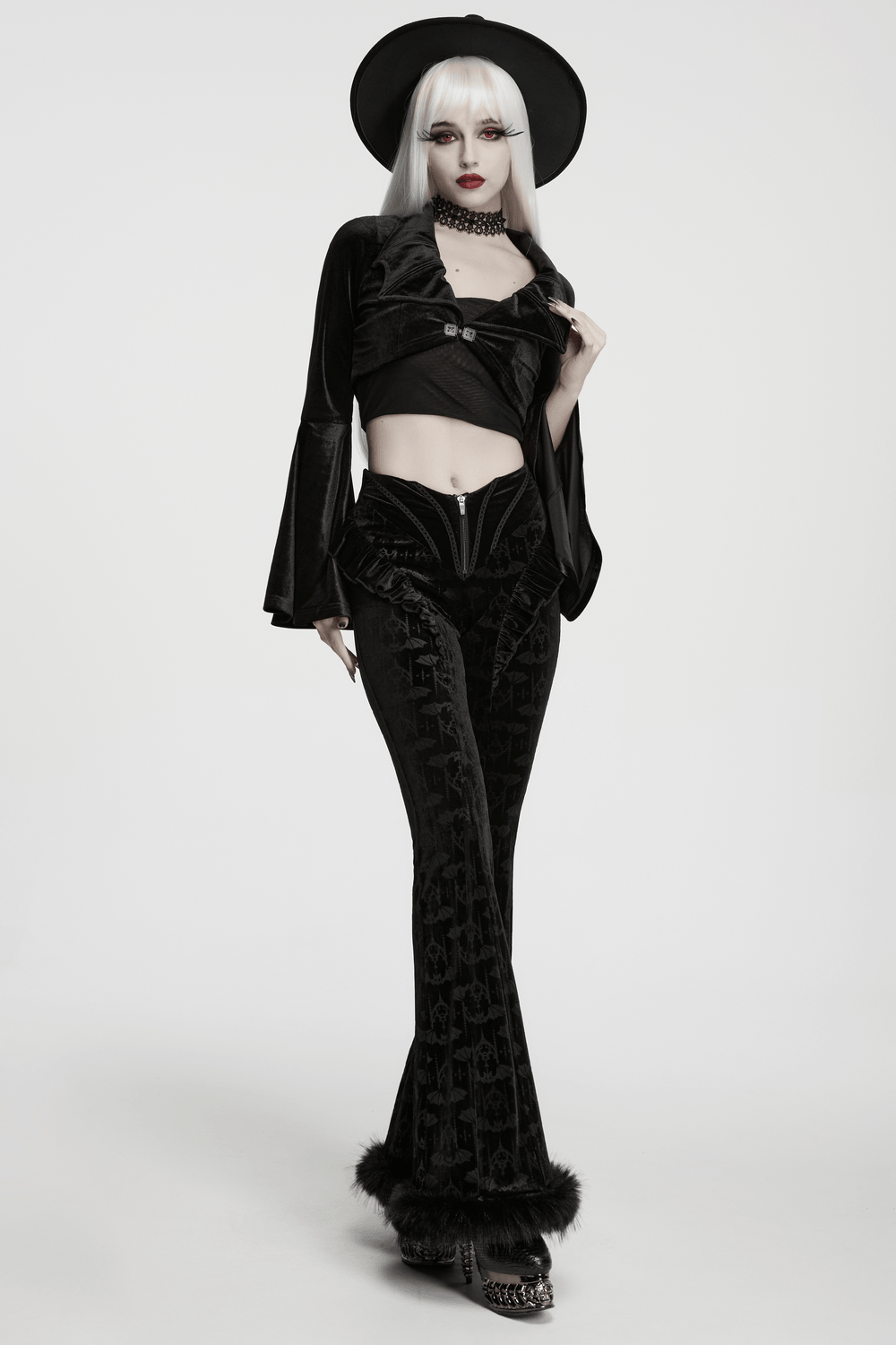 Gothic Bat Pattern Flared Pants with Ruffled Waist model wearing stylish gothic outfit with faux fur trim.