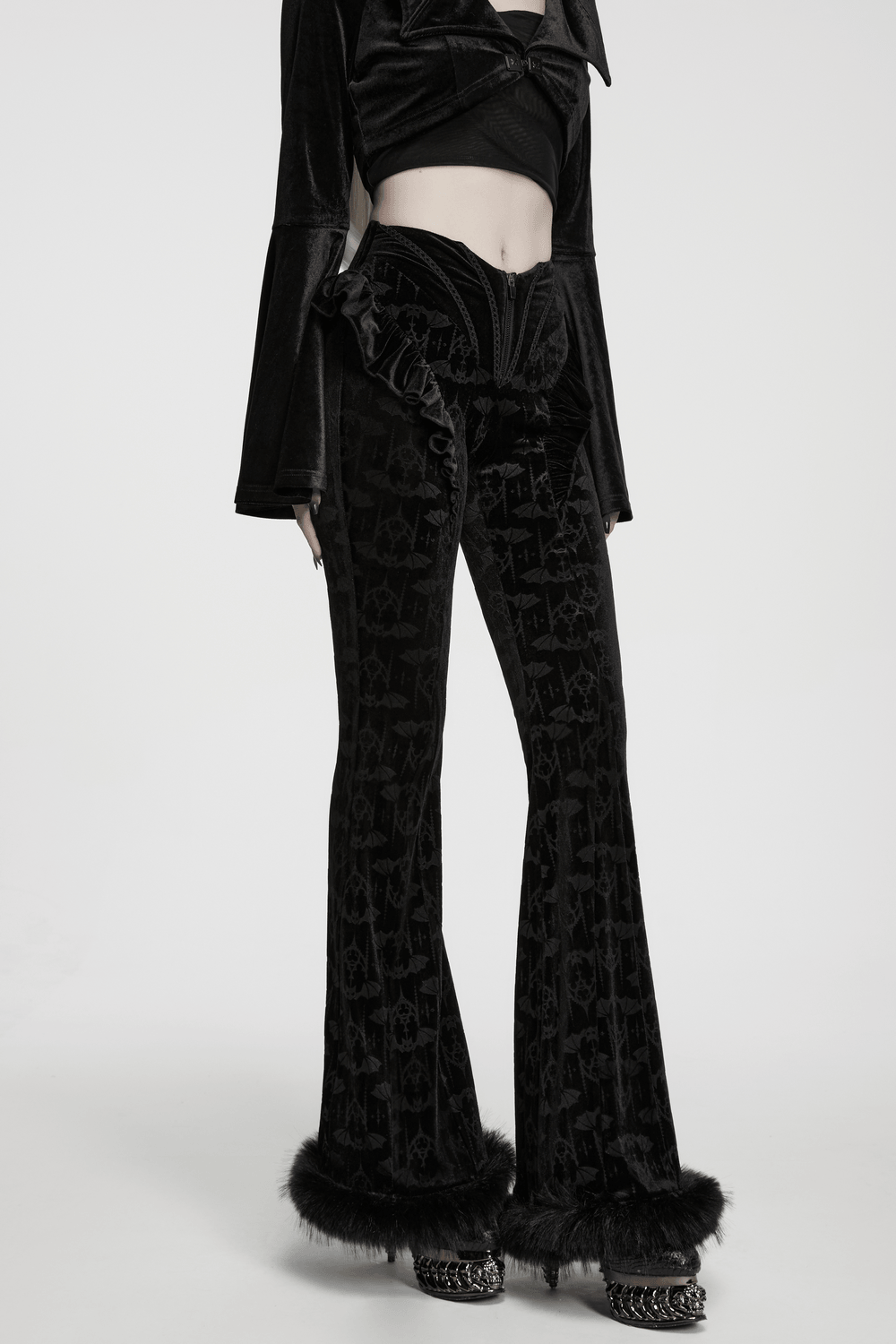 Gothic Bat Pattern Flared Pants with Ruffled Waist featuring a dramatic black velvet design and faux fur trim.