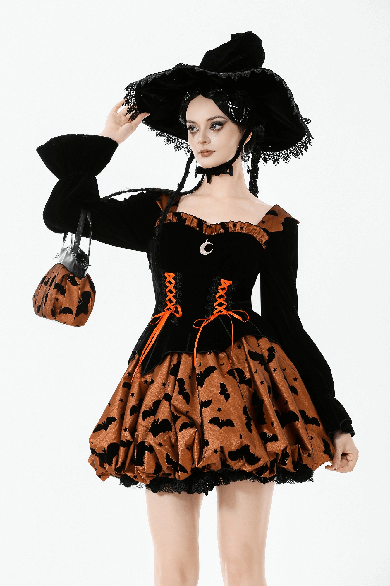 Gothic Bat Print Puff Sleeved Dress with Corset Lacing worn by model with witch hat and bat print skirt.