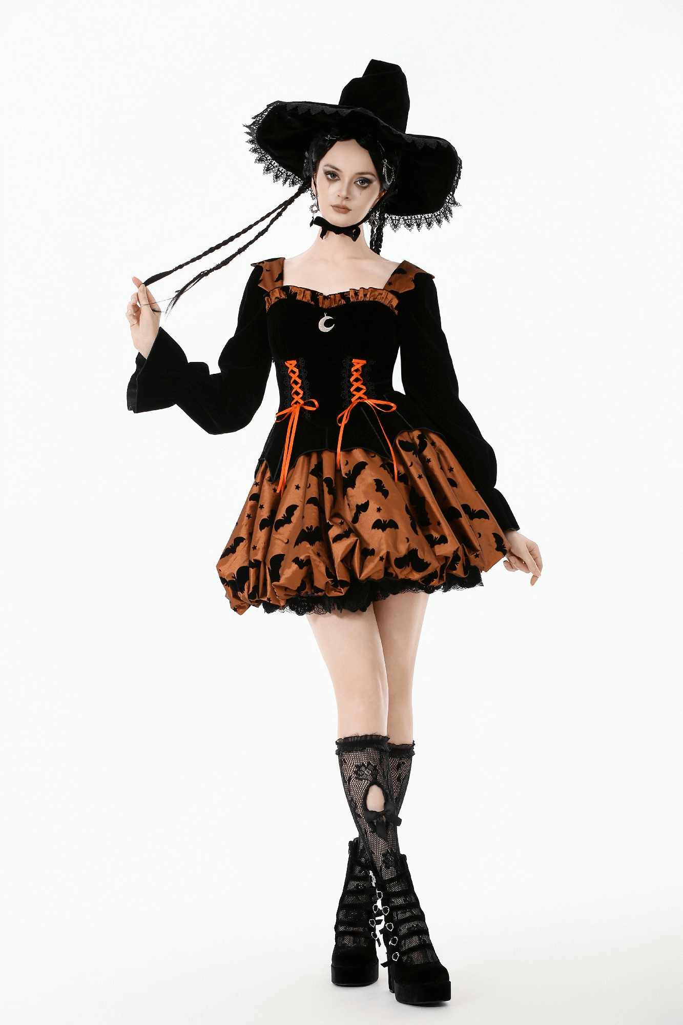 Gothic Bat Print Puff Sleeved Dress with Corset Lacing worn by a model, showcasing its elegant details and playful design.