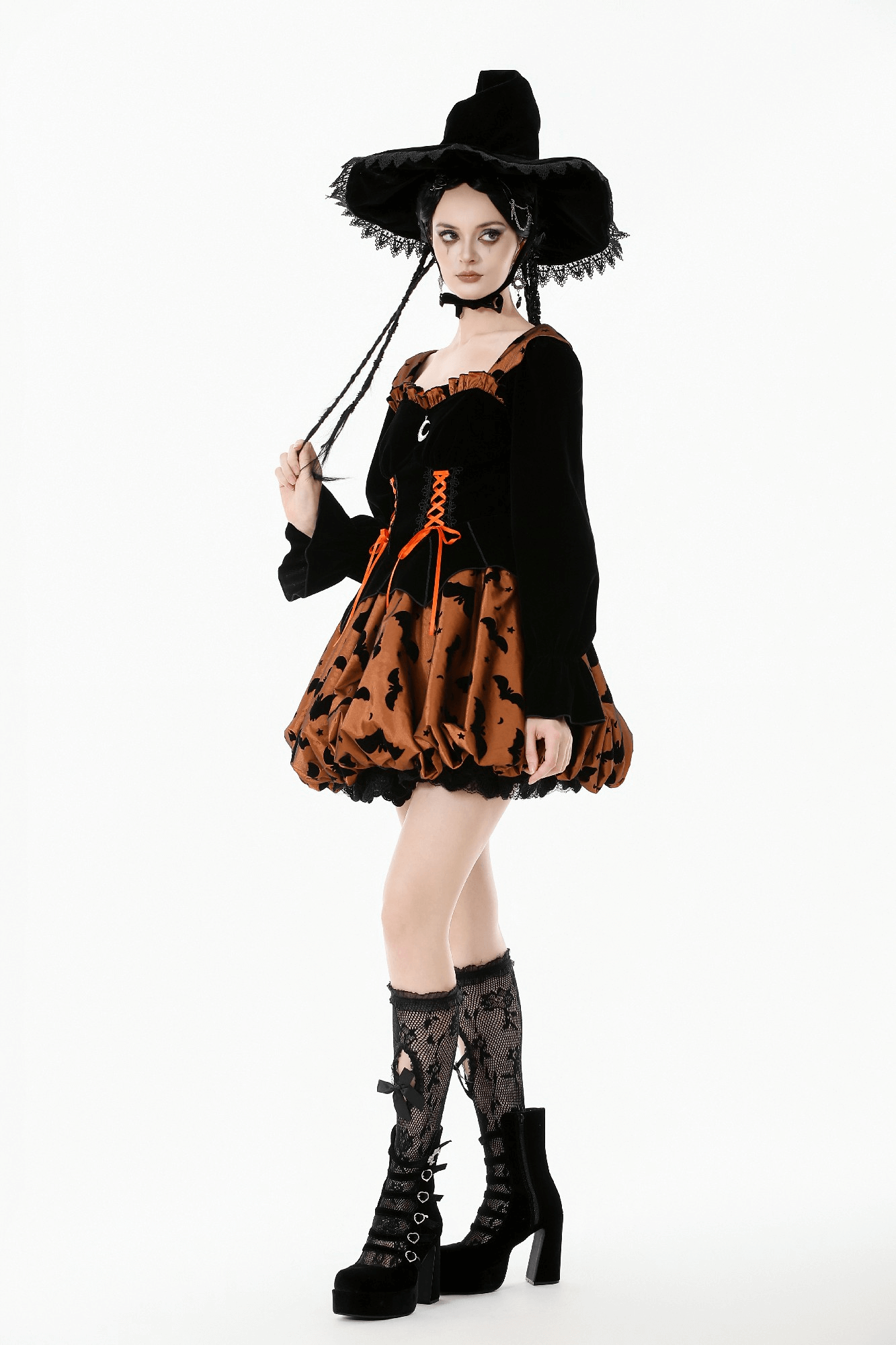 Gothic Bat Print Puff Sleeved Dress with Corset Lacing worn by model, showcasing bats and lace-up details.