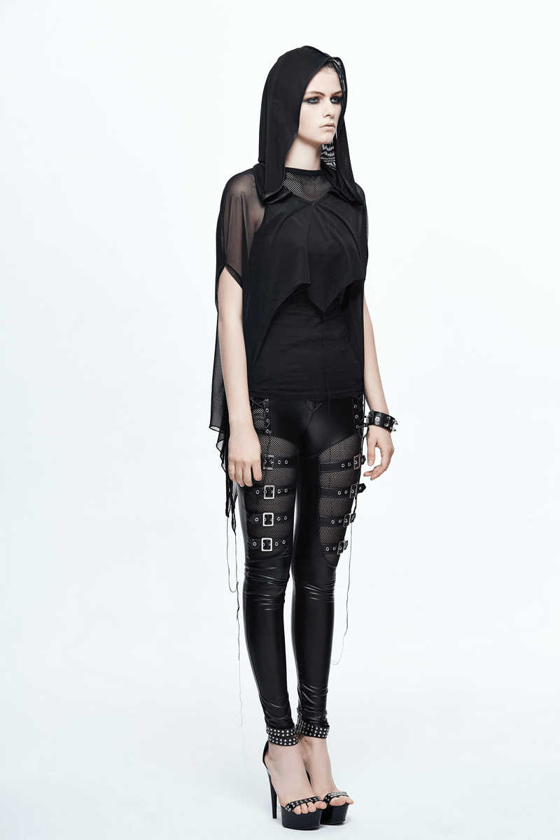 Gothic bat style woman's black mesh cape with asymmetrical hem, paired with stylish black leggings and chic heels.