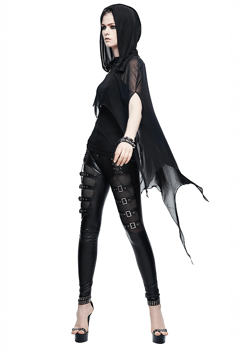 Gothic woman in black mesh hooded cape with asymmetrical hem and stylish black leggings.