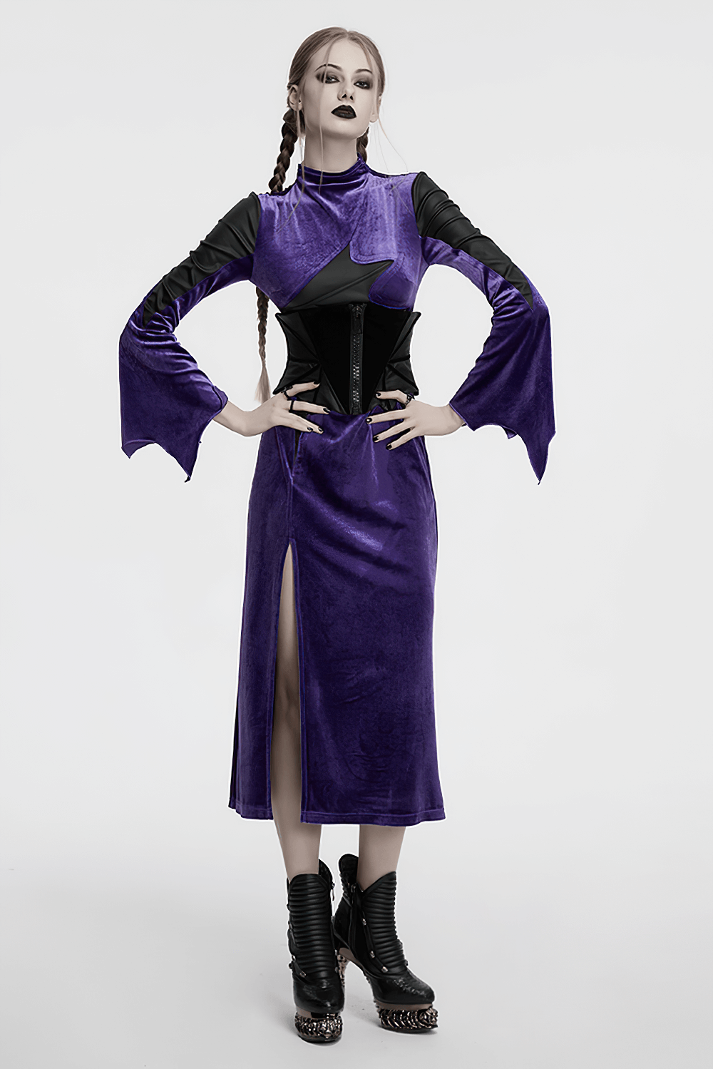 Model wearing a Gothic Bat Waist Corset Belt with velvet, featuring bat-wing sleeves and a bold purple dress.