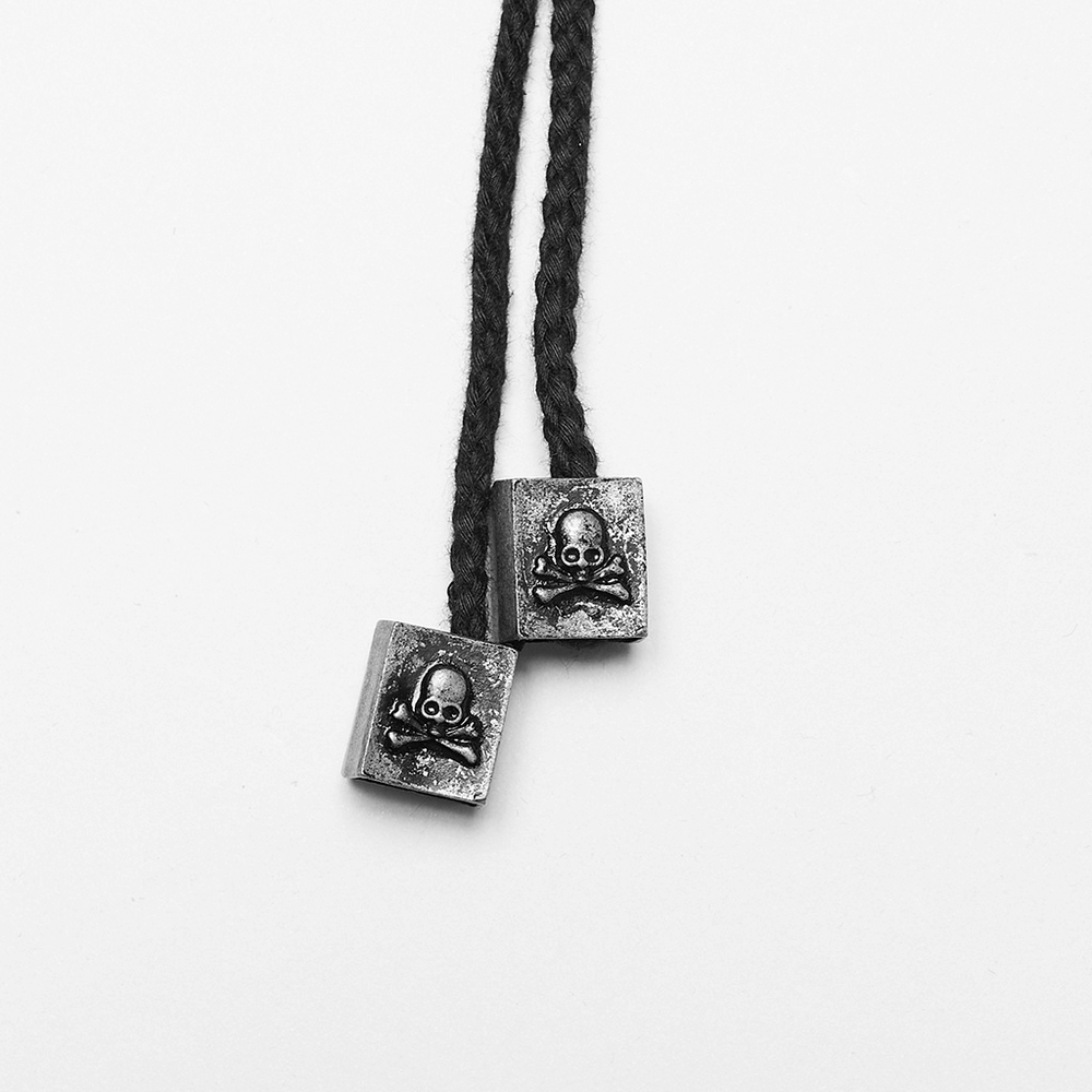 Stylish skull-accented black cord ends for gothic fashion accessories.