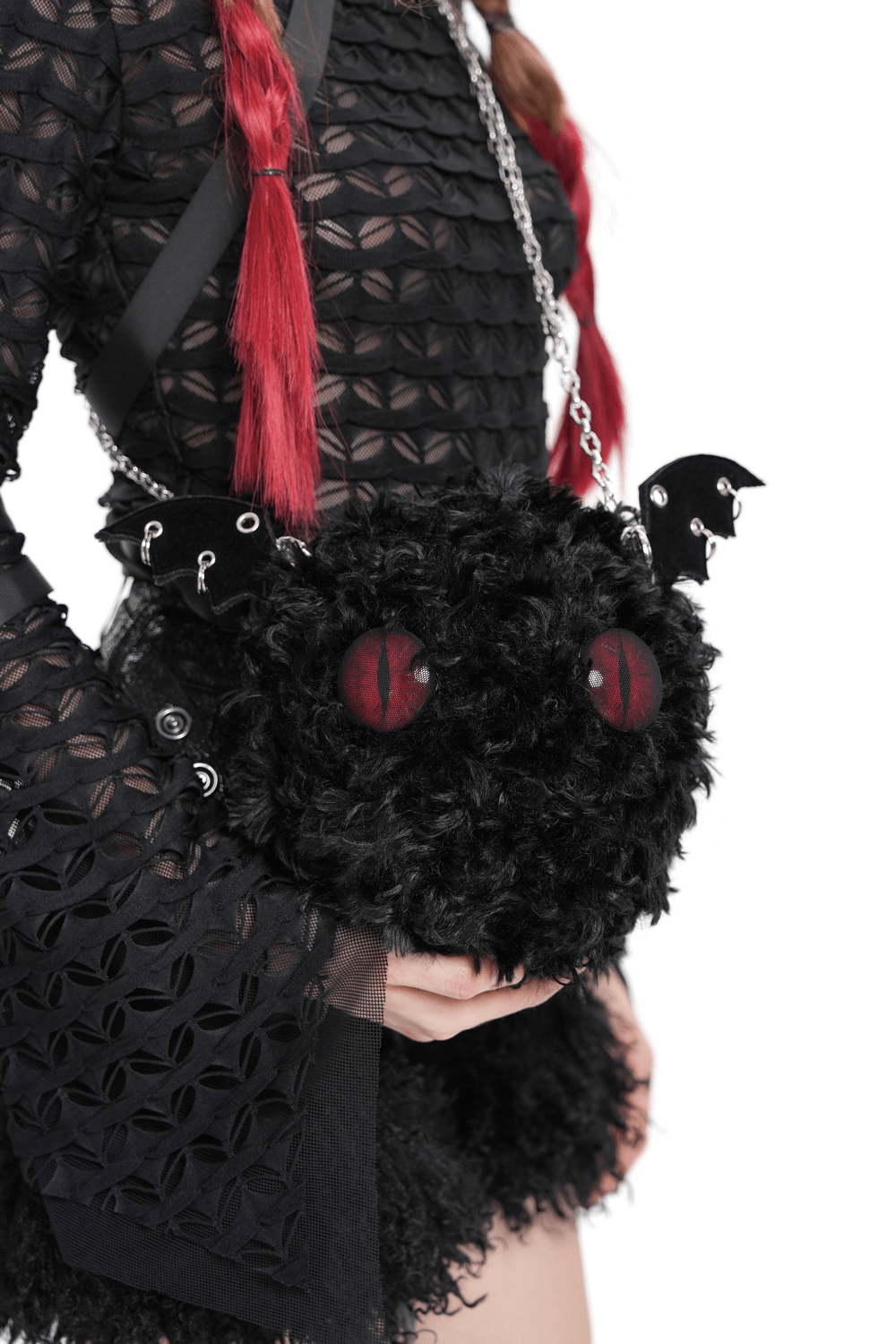 Gothic bat wing plush shoulder bag with red eyes and chains, perfect for alternative fashion and spooky vibes.