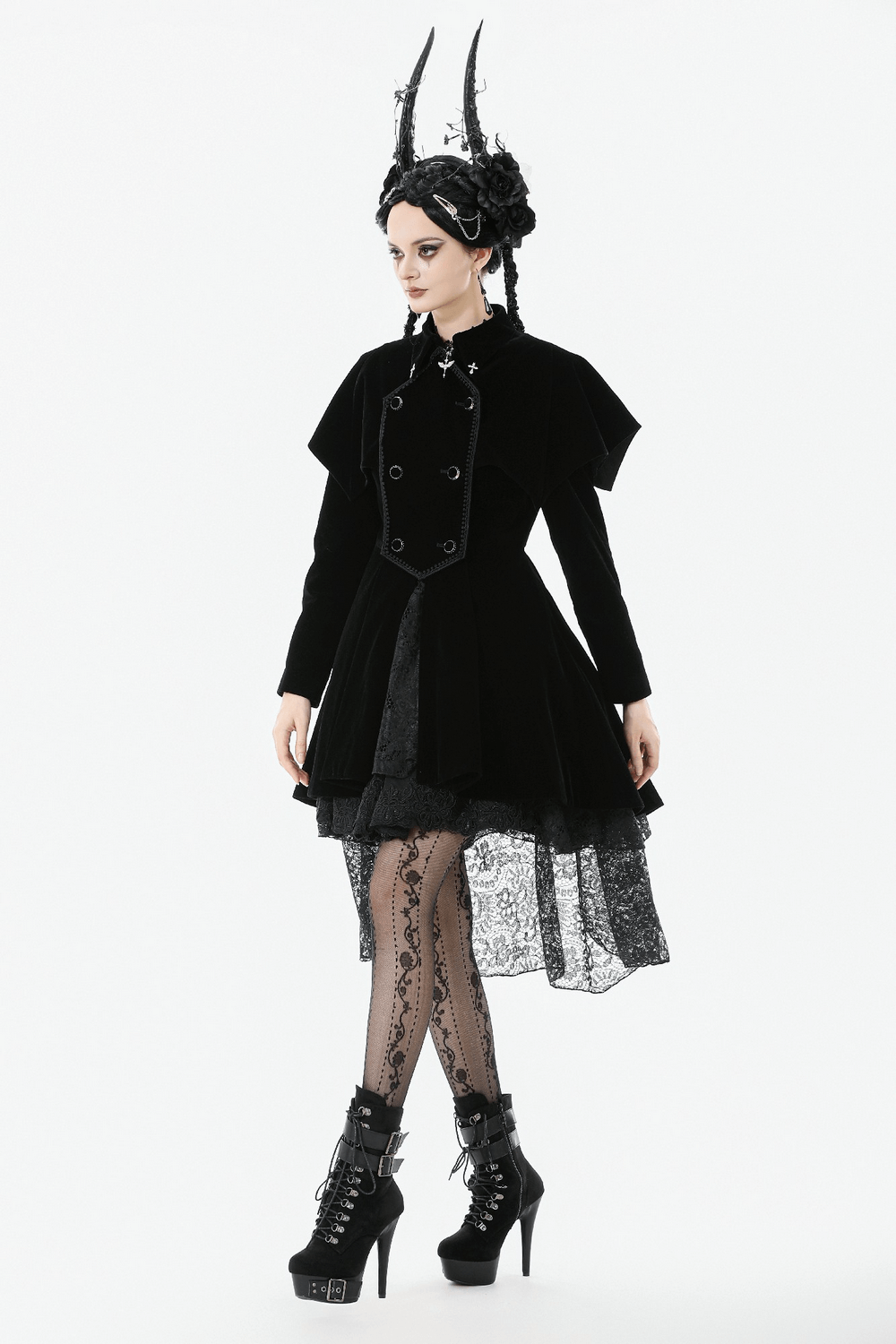 Gothic Bat-Winged Velvet Coat with Cross Collar Detail modeled by a woman in black heels and lace leggings.