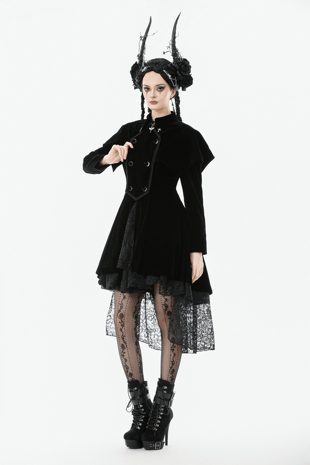 Gothic Bat-Winged Velvet Coat with Cross Collar Detail worn by a model, featuring a dramatic black velvet design.