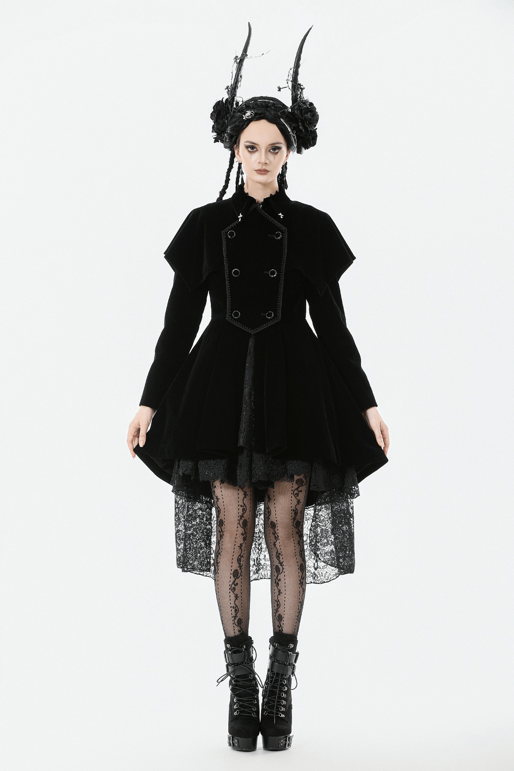 Gothic Bat-Winged Velvet Coat with Cross Collar Detail modeled by a woman in dark attire and striking accessories.
