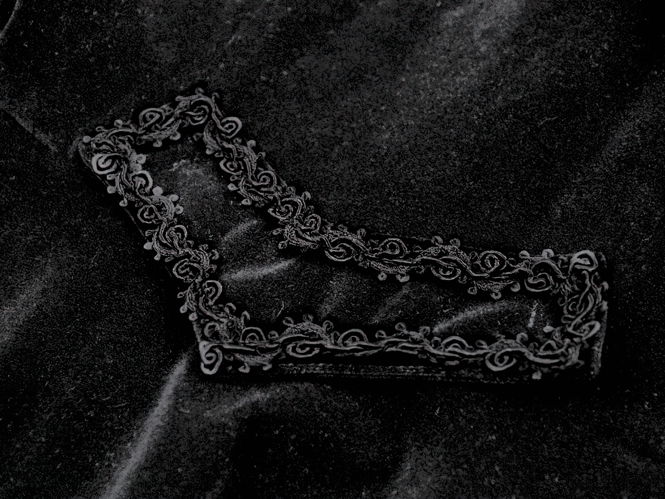 Gothic Bat-Winged Velvet Coat with Cross Collar Detail showcasing intricate lace detail on black velvet fabric.