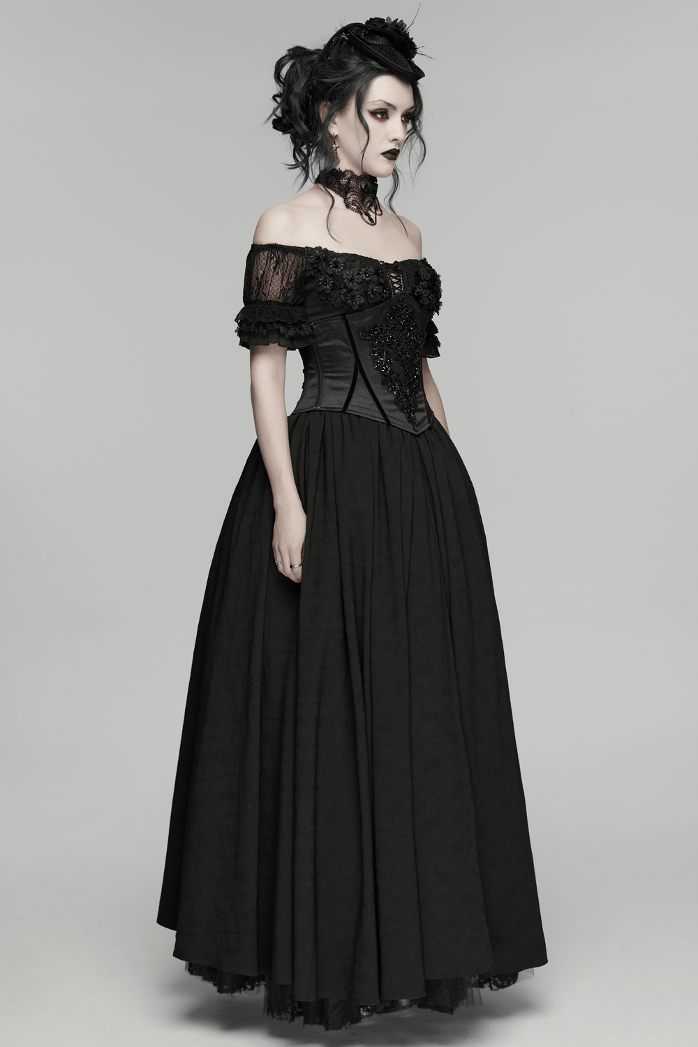 Gothic Bead Embroidered Corset with Lace Up Back worn with a long black skirt, showcasing a dark romantic style.