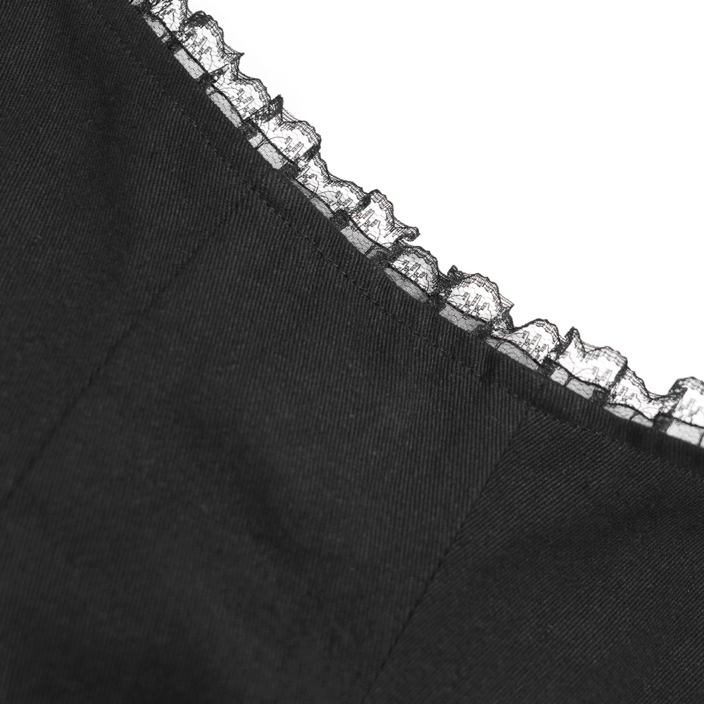 Close-up of lace hem detail on gothic black and burgundy maxi skirt, showcasing intricate design and elegant texture.