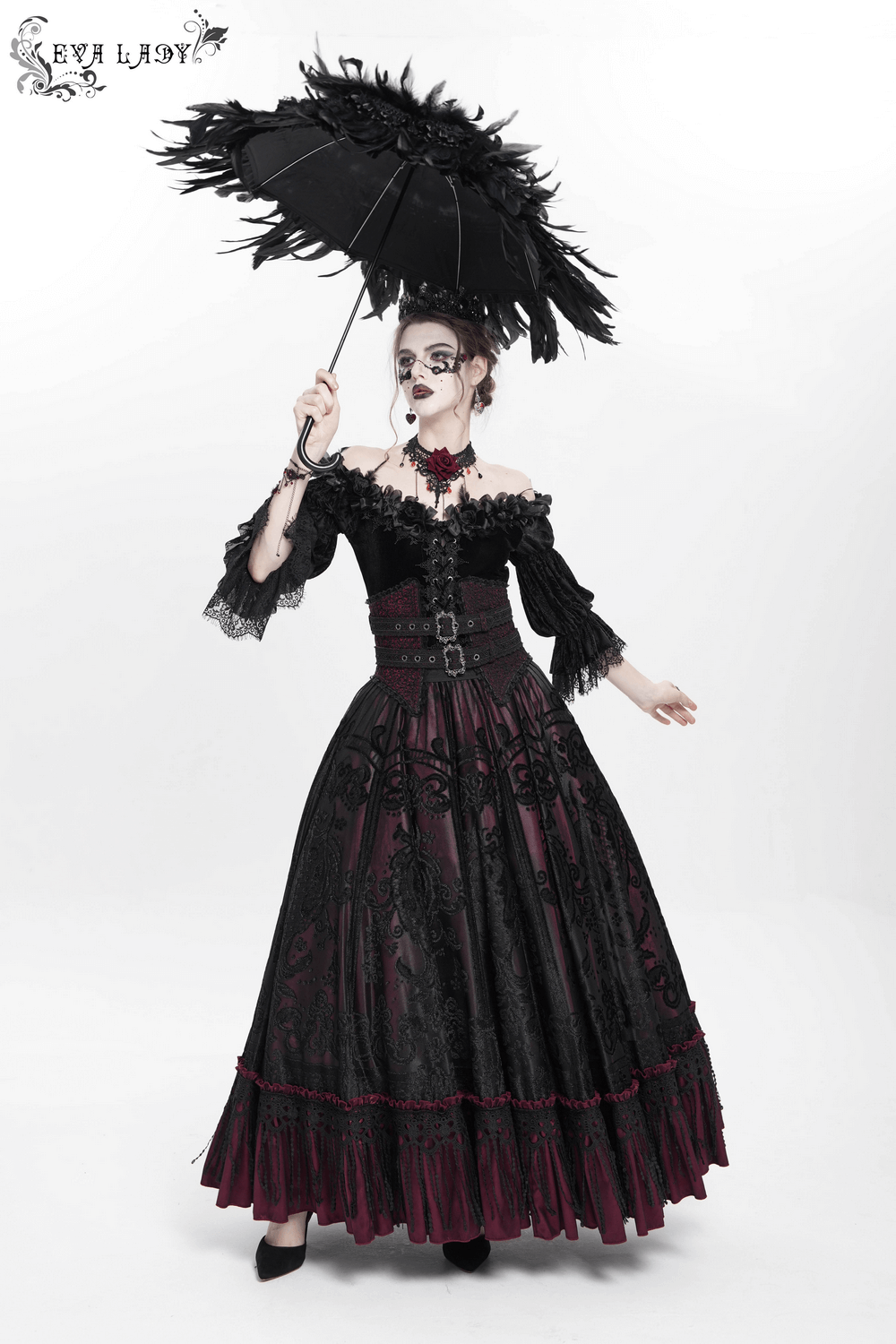 Gothic black and burgundy maxi skirt with lace hem, worn elegantly with a parasol, showcasing Victorian style.