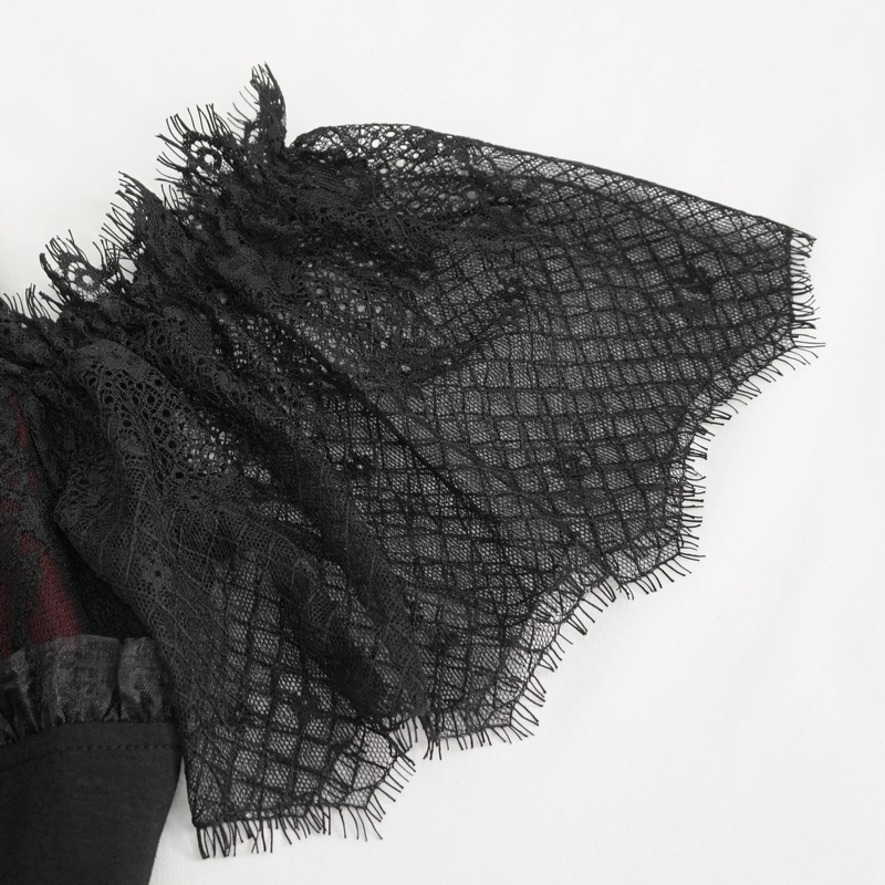 Close-up of black lace sleeve detail on gothic off-shoulder top, showcasing intricate design and luxurious texture.
