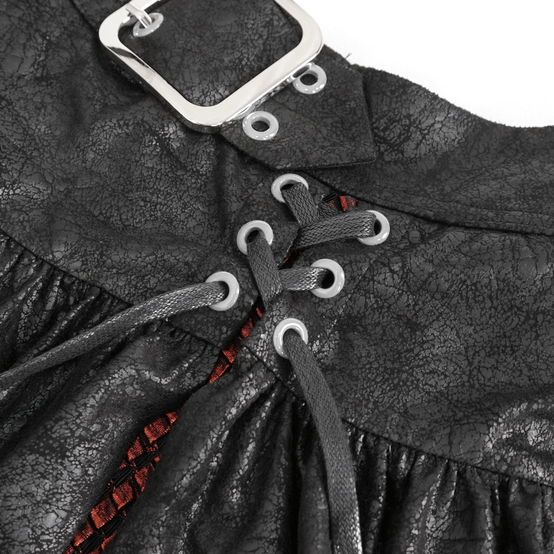 Close-up of gothic black and red splicing skirt with buckle and lace-up details, showcasing edgy fashion design.