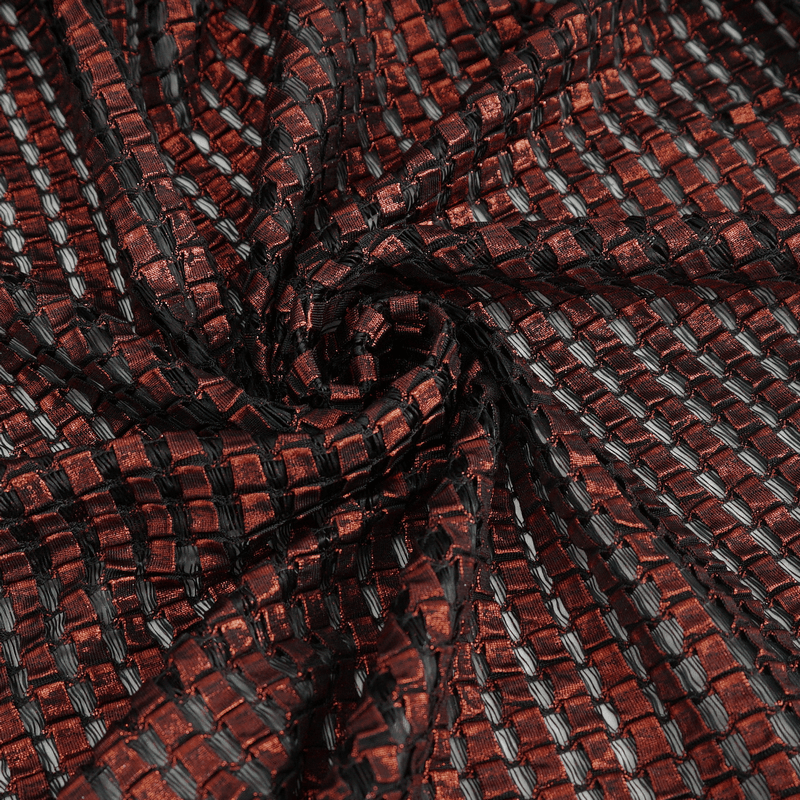 Close-up of gothic black and red fabric with a woven texture, perfect for a bold skirt design.