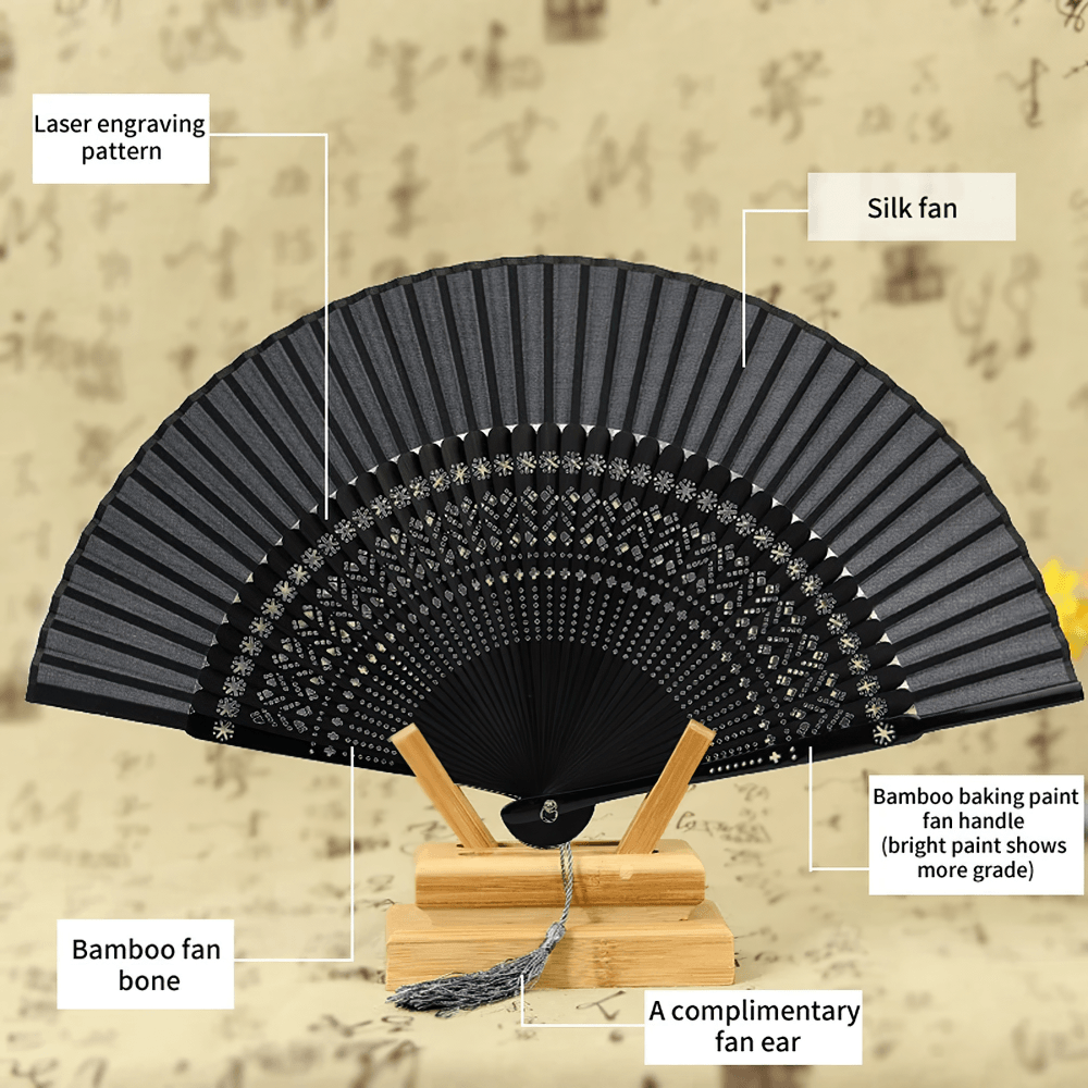 Abanico plegable gótico de bambú negro con borla